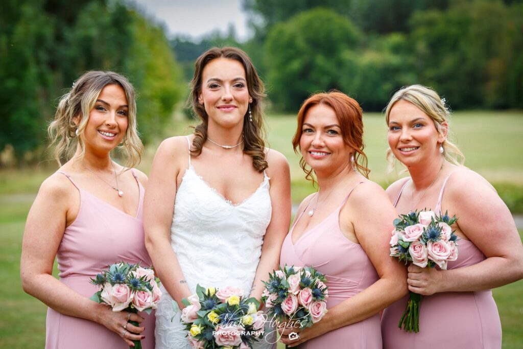 Bridesmaids-posing-at-wedding-in-North-East-England-by-Chris-Hughes-Photography